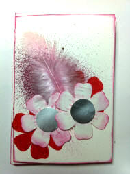 carte plume et fleurs roses