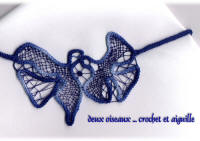collier deux oiseaux dentelle à l'aiguille